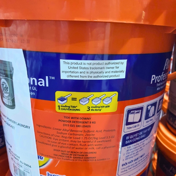 Tide Professional 9KG bucket with import warning label for non-U.S. market detergent