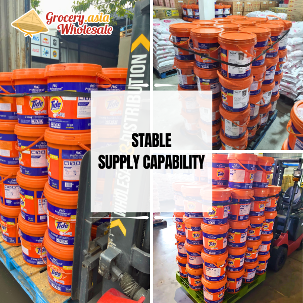 Multiple pallets of Tide detergent buckets in warehouse, showcasing reliable delivery.