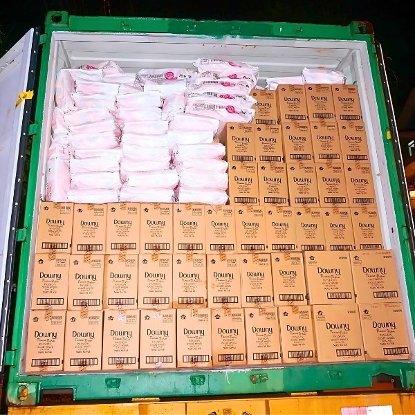 Mixed container with Downy Passion fabric softener and other FMCG products, prepared for wholesale shipment by Asia Grocery