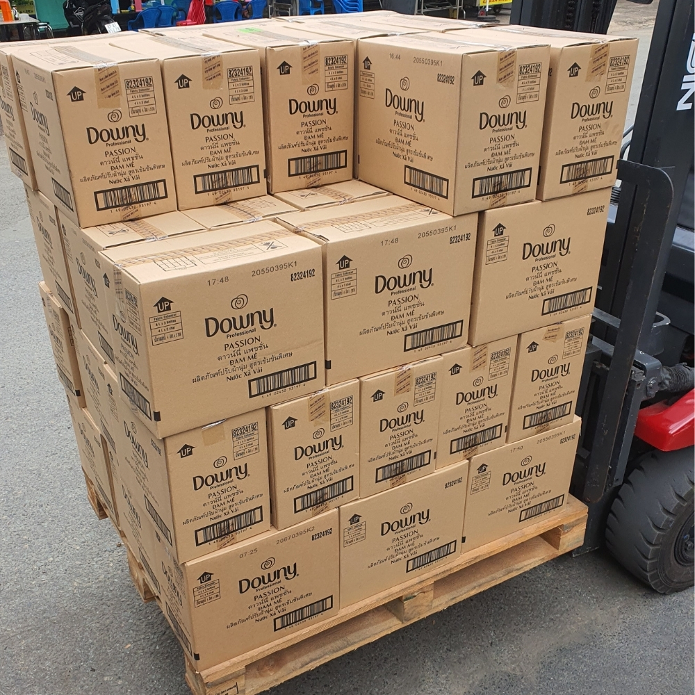Forklift handling pallets of Downy Passion boxes at Asia Grocery for efficient wholesale distribution