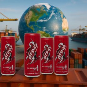 Shipping containers of Sting Energy Drink at a dock, symbolizing global export.