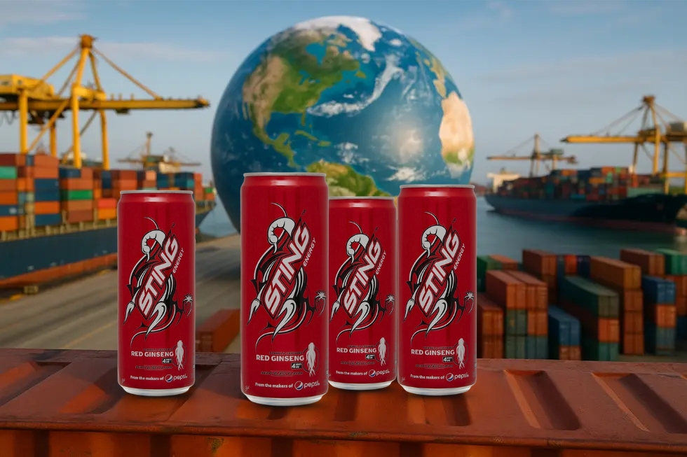 Shipping containers of Sting Energy Drink at a dock, symbolizing global export.