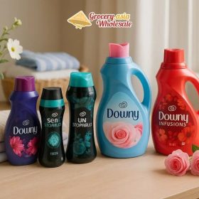 A collage of Downy products with freshly washed clothes, highlighting Downy scent layering benefits.