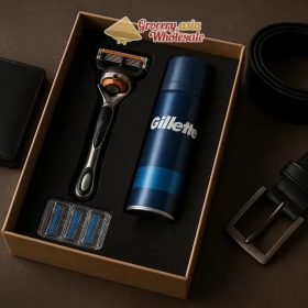 Various Gillette gift sets including razors, shaving foam, and wallets, displayed on a sleek boardroom table for corporate gifting.