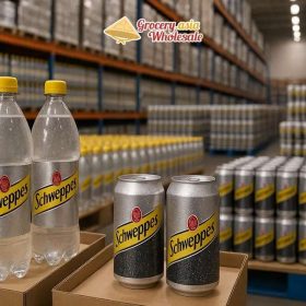 Schweppes soda water bottles and cans in a wholesale environment.